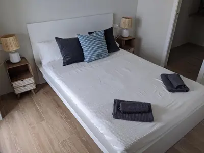 Cama o camas de una habitación en Casa del Tomate Azul