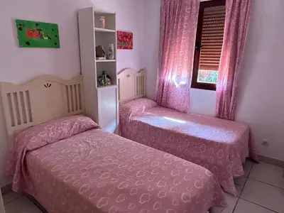 Cama o camas de una habitación en Jardines Nuevo Vera bajo 2 dormitorios vistas al mar