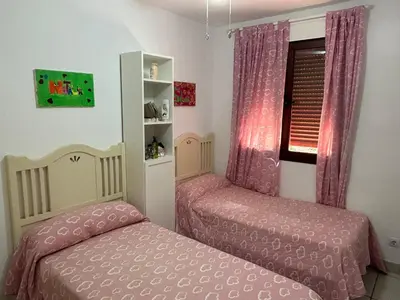 Cama o camas de una habitación en Jardines Nuevo Vera bajo 2 dormitorios vistas al mar