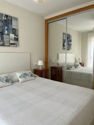 Cama o camas de una habitación en ÁTICO Paraíso Beach con piscina privada