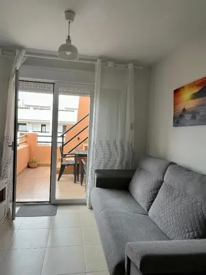 Zona de estar de ÁTICO Paraíso Beach con piscina privada