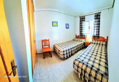 Cama o camas de una habitación en Bajo piscina VERAMAR 2 Vera Playa 500 metros a la playa