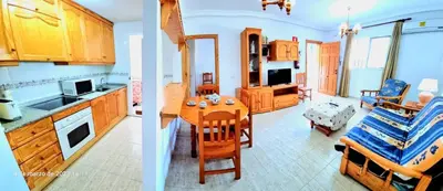 Una cocina o zona de cocina en Bajo piscina VERAMAR 2 Vera Playa 500 metros a la playa