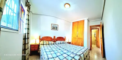 Cama o camas de una habitación en Bajo piscina VERAMAR 2 Vera Playa 500 metros a la playa