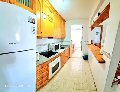Una cocina o zona de cocina en Bajo piscina VERAMAR 2 Vera Playa 500 metros a la playa