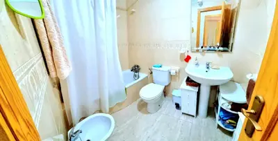 Un baño de Bajo VERAMAR 5 Vera Playa primera línea de playa