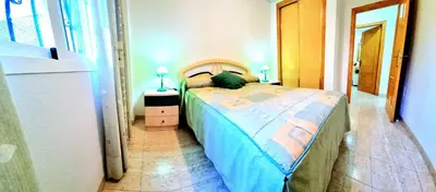 Cama o camas de una habitación en Bajo VERAMAR 5 Vera Playa primera línea de playa
