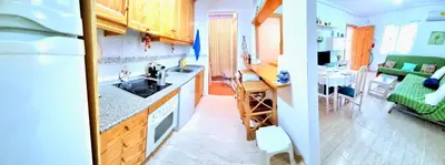 Una cocina o zona de cocina en Bajo VERAMAR 5 Vera Playa primera línea de playa