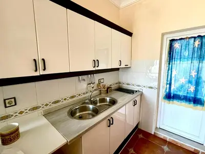 Una cocina o zona de cocina en Expoholidays Vistas al mar - A pie de playa