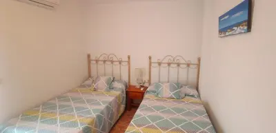 Cama o camas de una habitación en Ático en Buenavista playa
