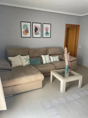 Zona de estar de APARTAMENTO ROMANILLA FRENTE AL MAR