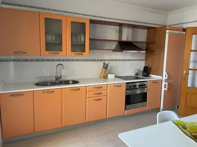 Una cocina o zona de cocina en APARTAMENTO ROMANILLA FRENTE AL MAR