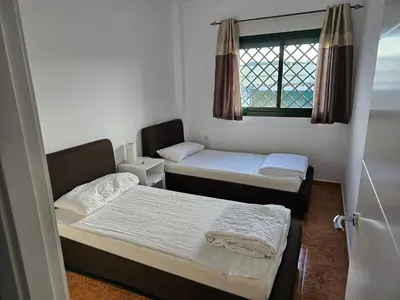 Cama o camas de una habitación en Private Pool- Rooftop Terrace & Bbq- AirCon