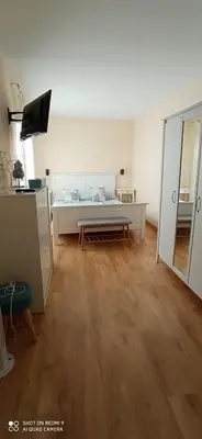 Una televisión o centro de entretenimiento en Precioso apartamento en pleno centro