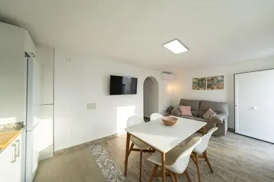 Una televisión o centro de entretenimiento en Apartamento Vela