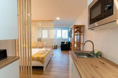 Cama o camas de una habitación en Trendy Homes Paradise II