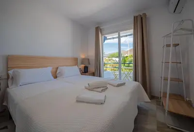 Cama o camas de una habitación en Apartamento de la Bahía 33