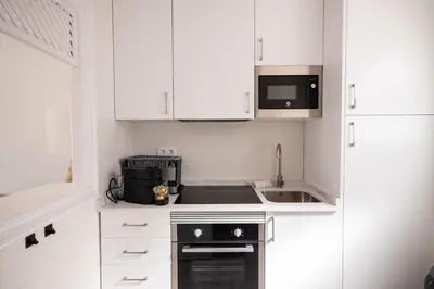 Una cocina o zona de cocina en Apartamento de la Bahía 33