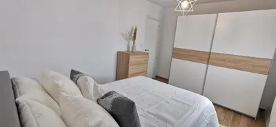 Cama o camas de una habitación en Vistas mar y montaña LasNegras
