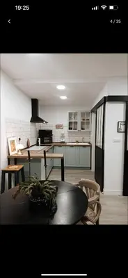 Una cocina o zona de cocina en Coqueto loft en la playa