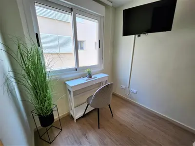 Una televisión o centro de entretenimiento en Apartamento La Gambita de Garrucha