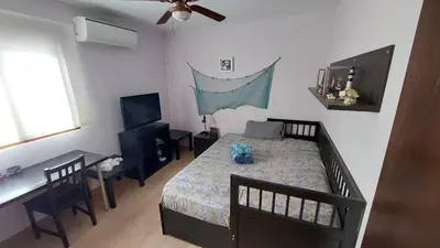 Una televisión o centro de entretenimiento en Vera Albacora IV Chalet