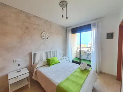 Cama o camas de una habitación en Vistas al mar, céntrico y junto a la Estación - by Aloha Palma