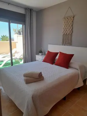 Cama o camas de una habitación en Piso Serena beach