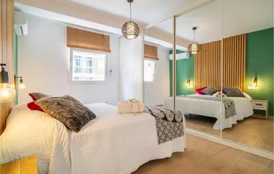 Cama o camas de una habitación en 3 Bedroom Amazing Apartment In Almería