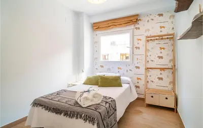 Cama o camas de una habitación en 3 Bedroom Amazing Apartment In Almería