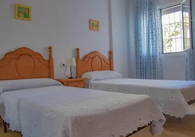 Cama o camas de una habitación en Apto Julia 1ª Línea De Playa