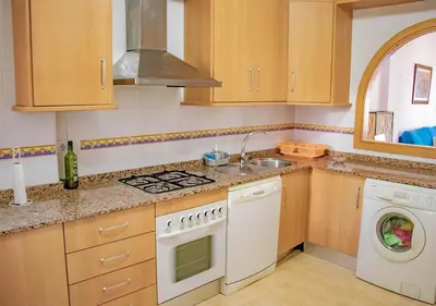 Una cocina o zona de cocina en Apto Julia 1ª Línea De Playa
