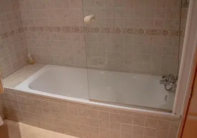 Un baño de Apto Julia 1ª Línea De Playa