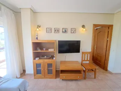 Una televisión o centro de entretenimiento en Ático Lomas del Mar 1 - Vera Playa
