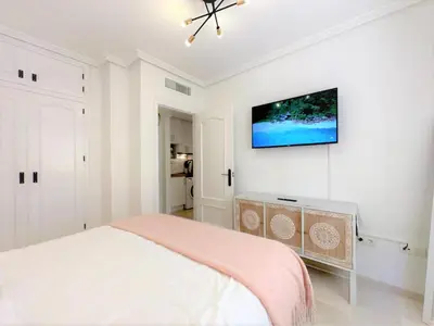 Cama o camas de una habitación en Casa Playa de Garrucha