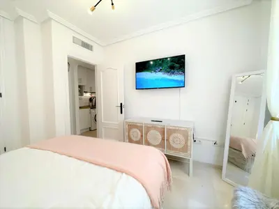 Una televisión o centro de entretenimiento en Casa Playa de Garrucha
