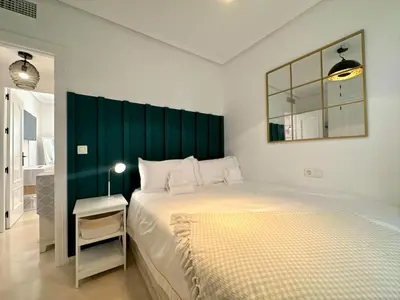 Cama o camas de una habitación en Casa Playa de Garrucha