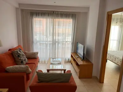 Una televisión o centro de entretenimiento en APARTAMENTO COSTA REY