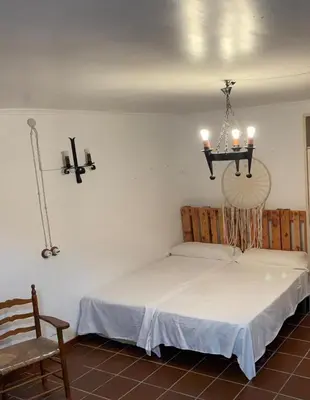 Cama o camas de una habitación en Cortijo Paulenca