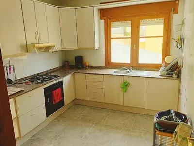 Una cocina o zona de cocina en RESIDENCIA TORTUGA MORA