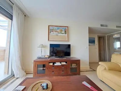 Una televisión o centro de entretenimiento en Ático Puerto y Playa Garrucha