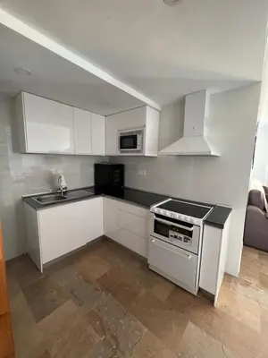 Una cocina o zona de cocina en exclusiva primera línea de playa