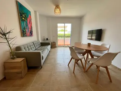 Una televisión o centro de entretenimiento en Lancón Boutique- Precioso apartamento a 150 m a pie de playa Lancón- Carboneras