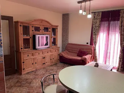 Una televisión o centro de entretenimiento en Apartamento 3 tesoros