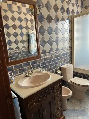 Un baño de Apartamento 3 tesoros