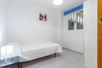 Cama o camas de una habitación en Precioso apartamento en el corazón de la ciudad-Wifi-Aire Acondicionado