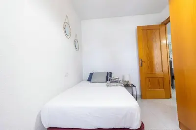 Cama o camas de una habitación en Precioso apartamento en el corazón de la ciudad-Wifi-Aire Acondicionado