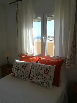 Cama o camas de una habitación en ATICO EN PRIMERA LINEA DE PLAYA