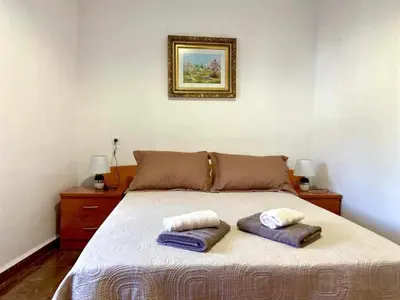 Cama o camas de una habitación en Casa Campoamor By Solymar Holiday