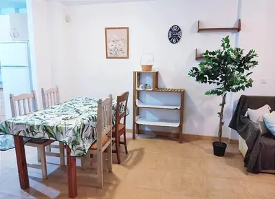 Zona de estar de Casa familiar a pie de piscina